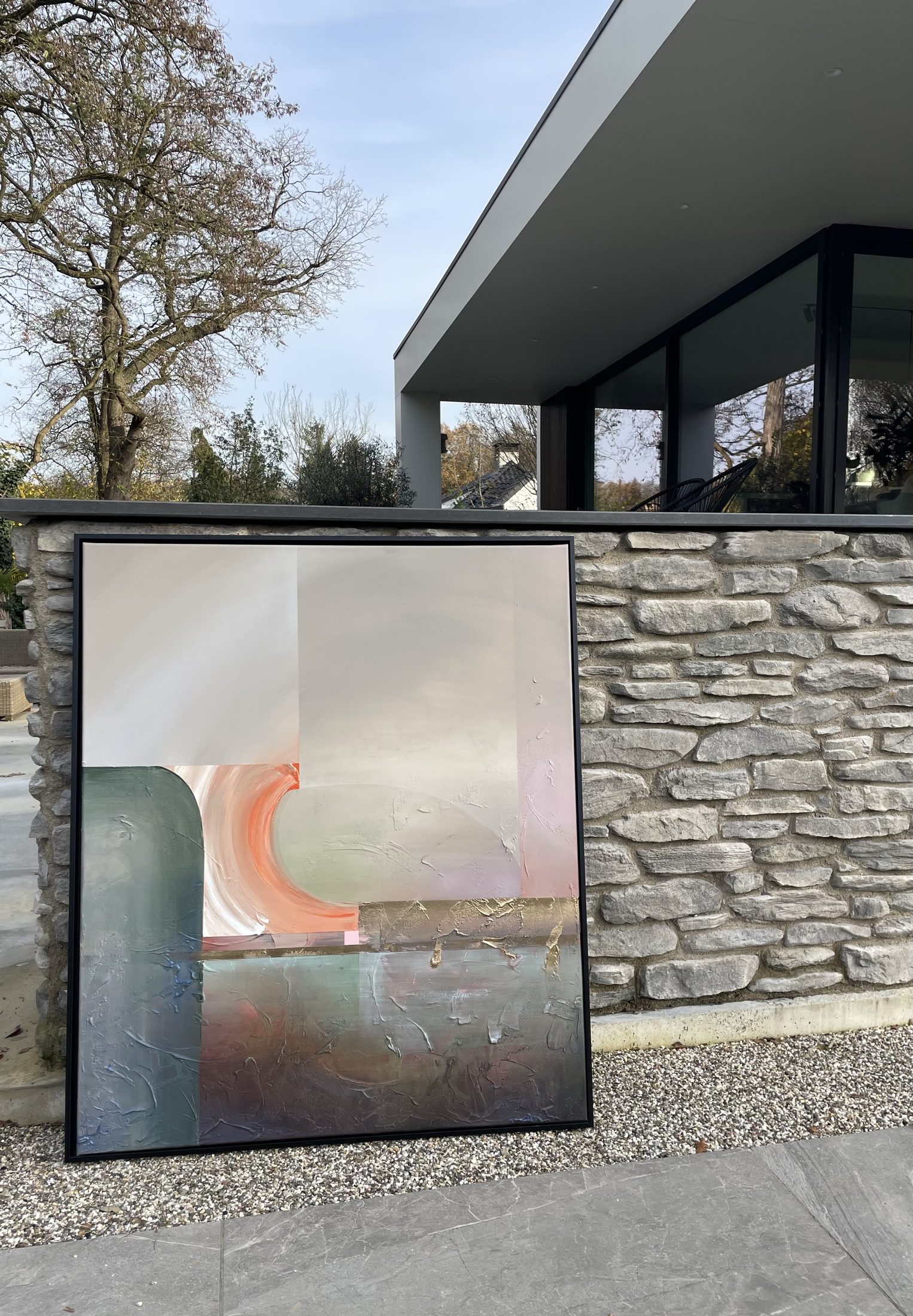 Schilderij buiten bij een woning